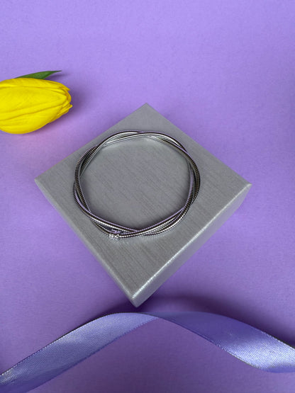 Bracciale Twist Elegante in Acciaio Inossidabile – Design Moderno e Raffinato